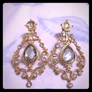 Golden shiny dangle earrings